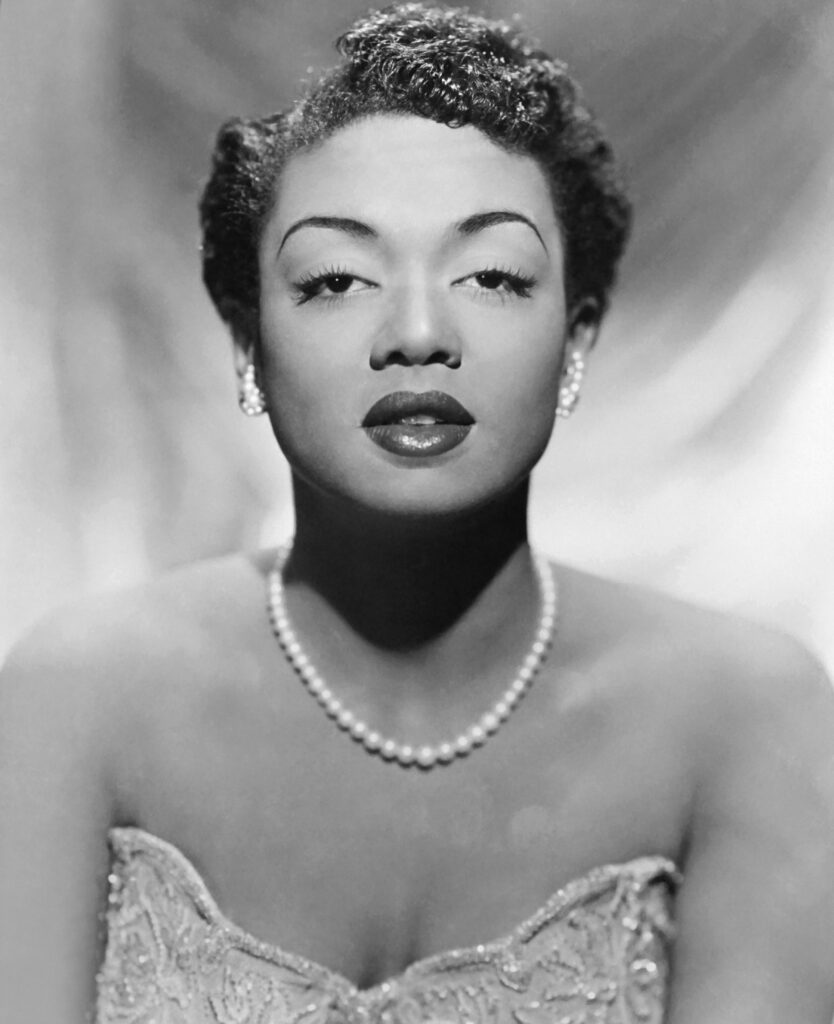 Hazel Scott, dress up wearing pearls